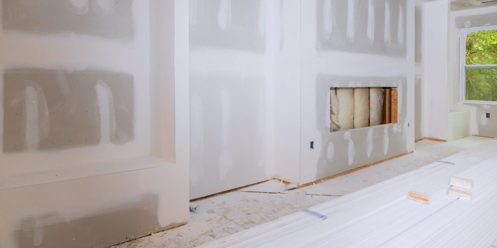 Hall house interior with drywall completely installed and painted wall